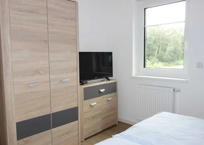 Ferienhaushaelfte Duenenblick *