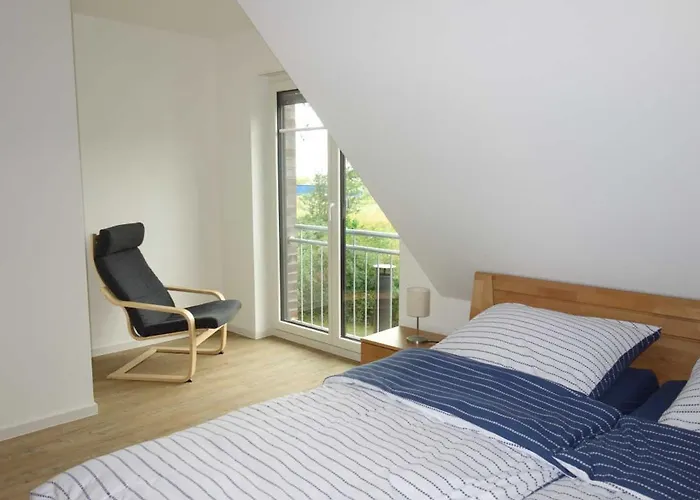 Dom wakacyjny Ferienhaushaelfte Duenenblick *